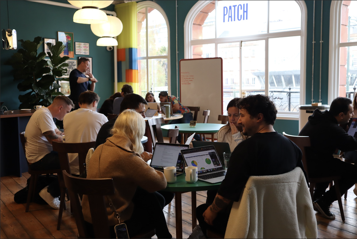 landscape photo of 3 sided cube's 2025 hackathon event
