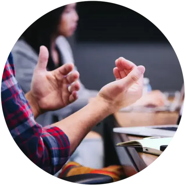 Hands being used to non-verbally support a conversation