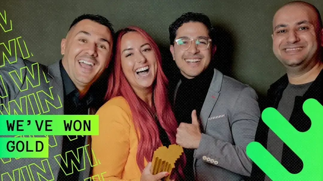 4 people collecting an award