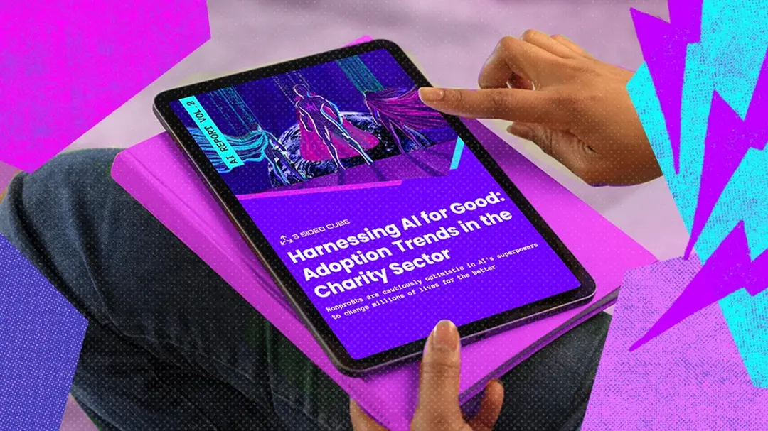Our brand new AI report that someone is scrolling through on a tablet. The front page of the report is displayed.